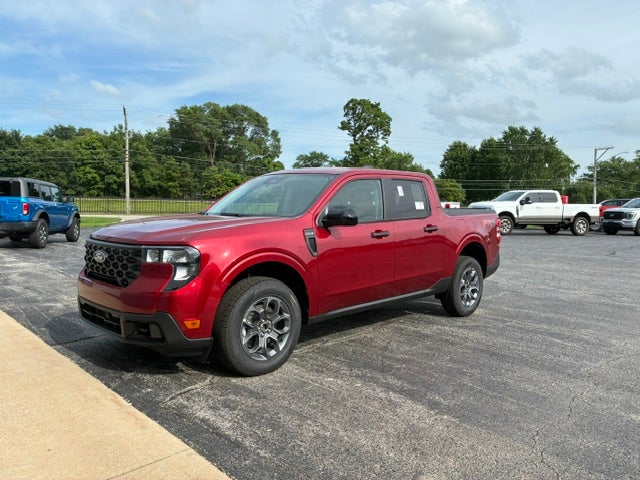 2026 Ford Maverick XLT AWD SuperCrew in Ruby Red Metallic — front three-quarter view