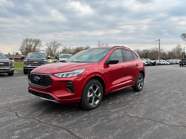 2024 Ford Escape ST-Line AWD in Rapid Red Metallic — front three-quarter view